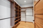 Extremely spacious walk in closet in the master suite.